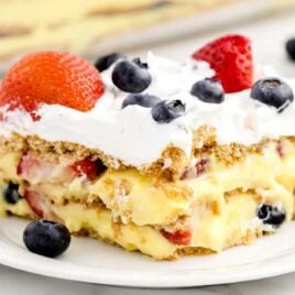 a close up shot of Berry Icebox Cake on a plate