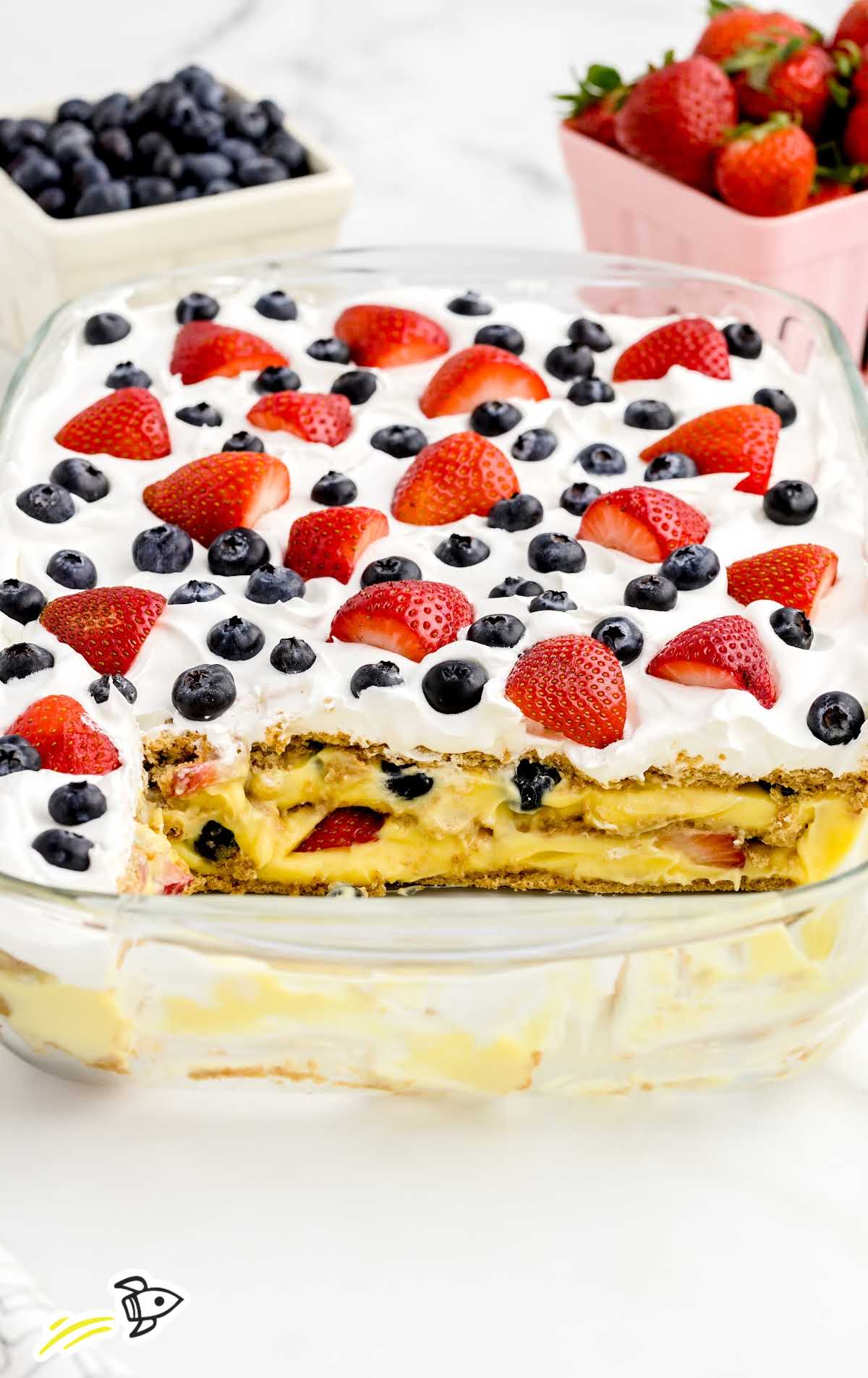 a close up shot of Berry Icebox Cake in a baking dish