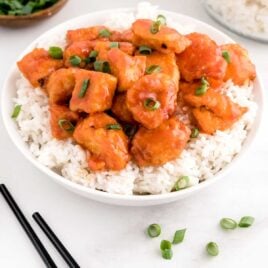 close up shot of Firecracker Chicken with rice on a plate