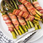 close up overhead shot of bacon wrapped asparagus on a plate
