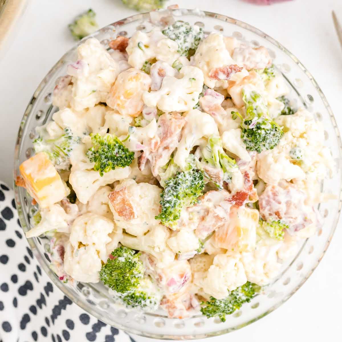 close up overhead shot of Broccoli Cauliflower Salad in a bowl