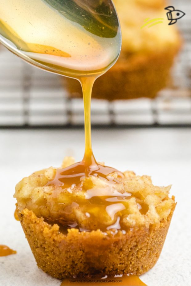 close up shot of a Caramel Apple Bites with caramel sauce being drizzled on the top
