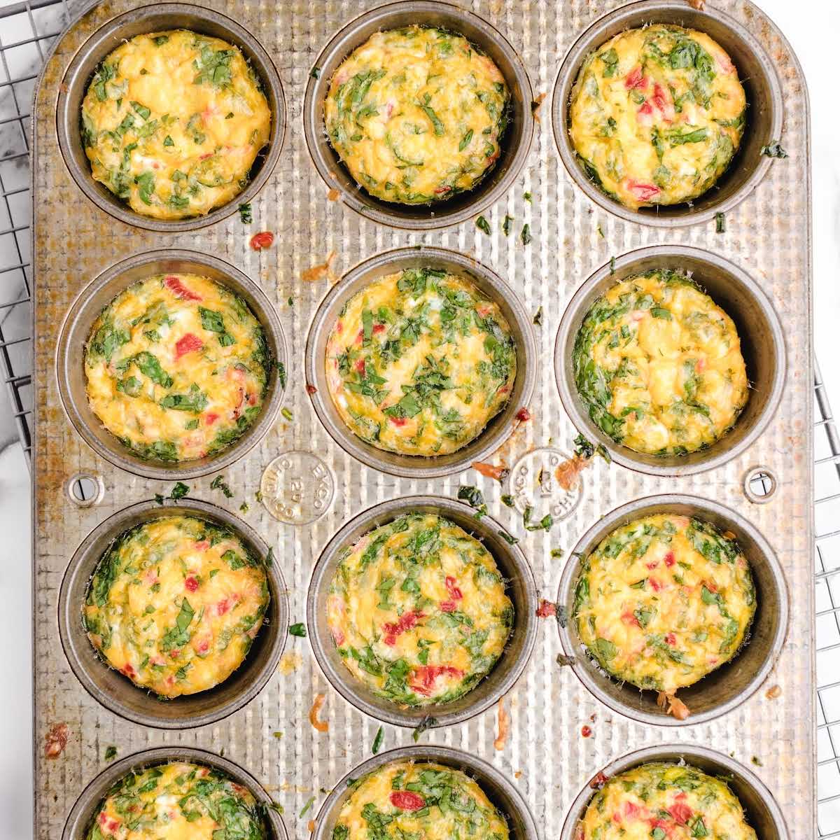 close up shot of Egg Bites in a muffin pan