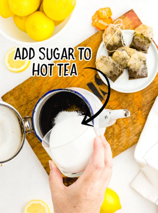 sugar added to a cup of hot tea
