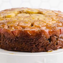 close up shot of a Banana Upside-Down Cake on a cake stand