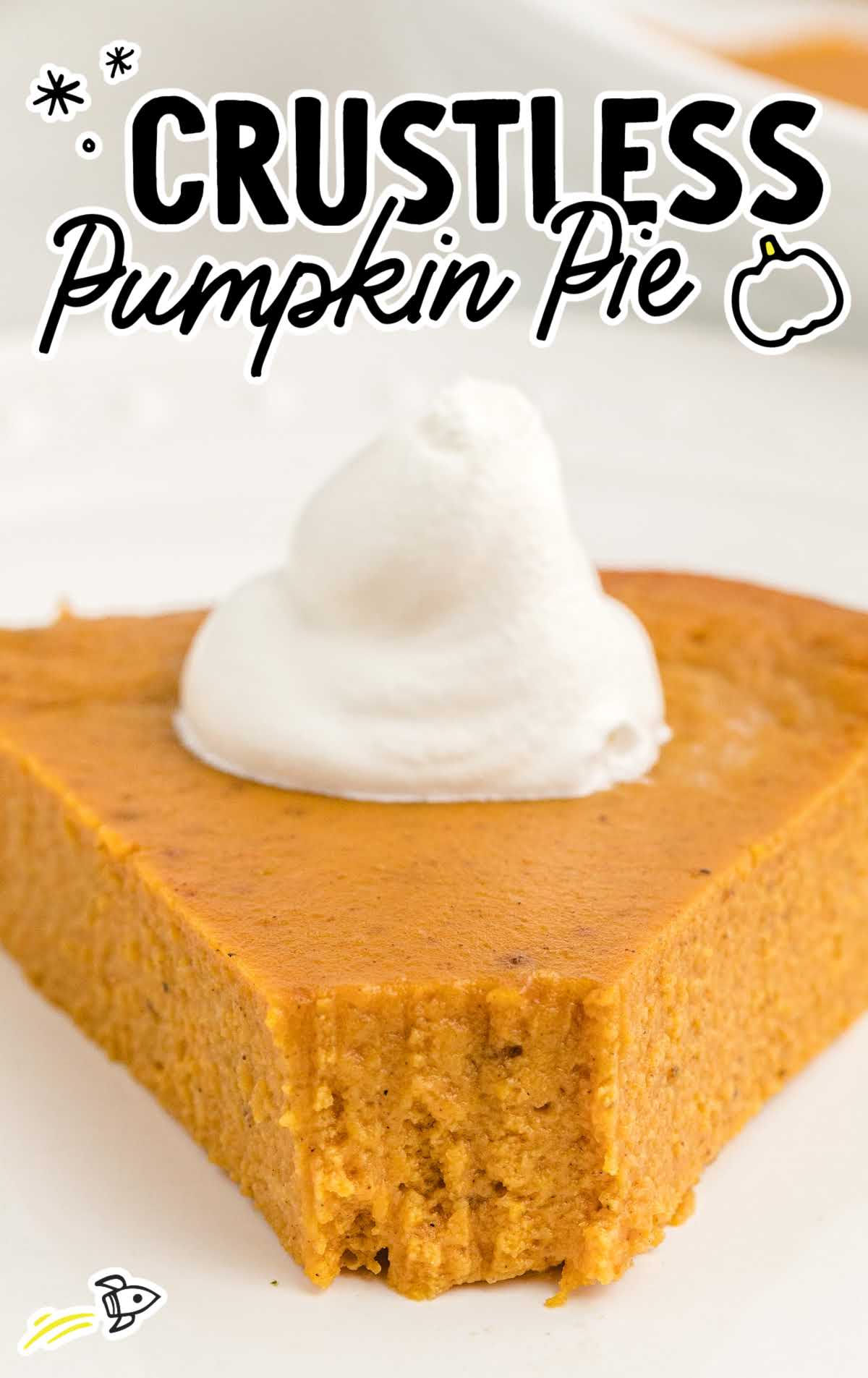 close up of a slice of crustless pumpkin pie with a bite taken out and text overlay