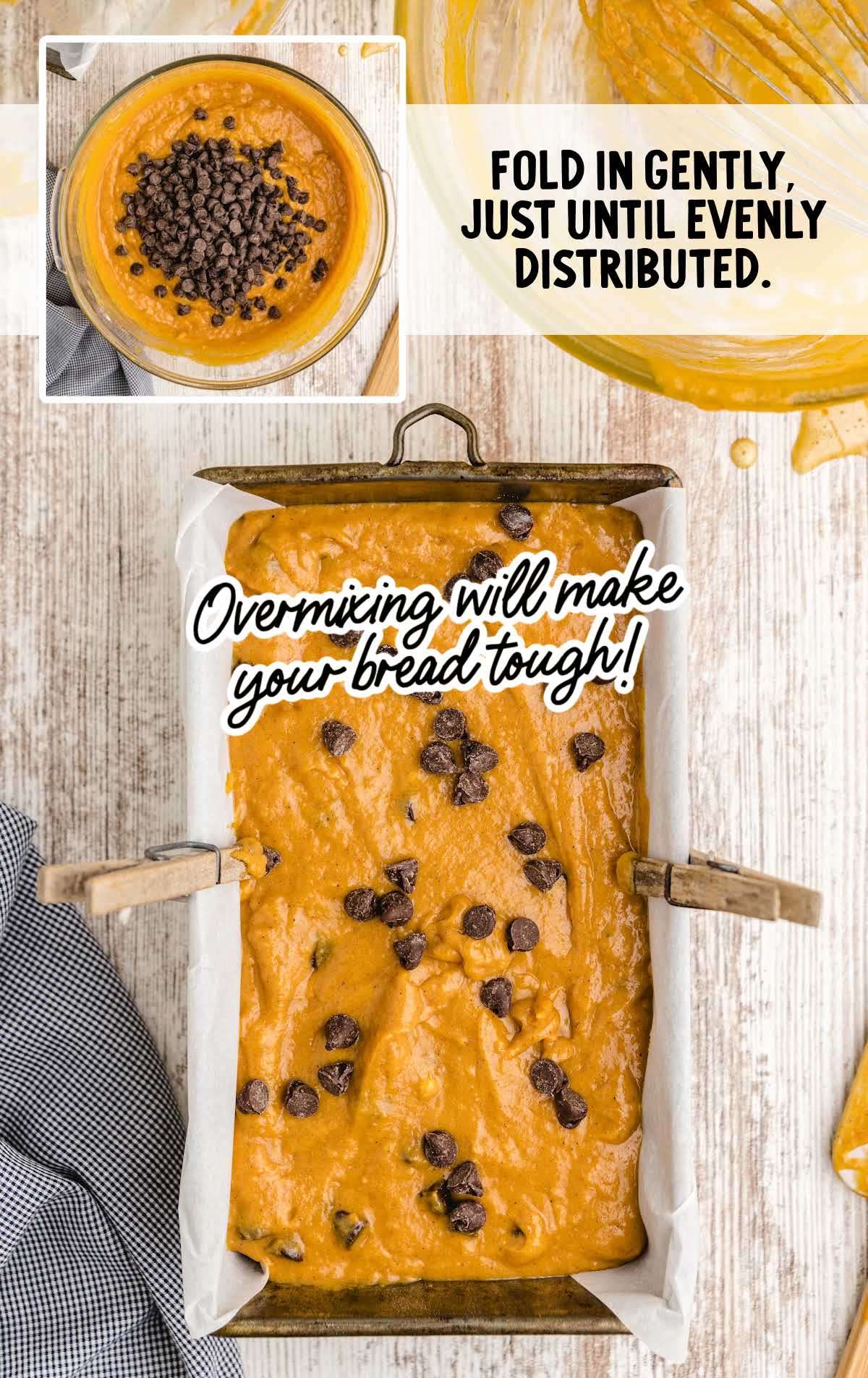 Pumpkin chocolate chip bread batter in a loaf pan with chocolate chips on top, showing mixing tips to avoid overmixing.