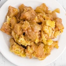 close up overhead shot of a serving of apple dump cake on a plate