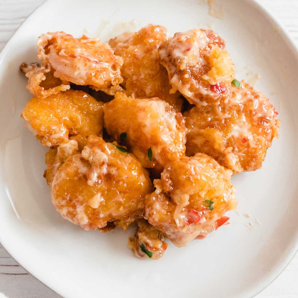 close up overhead shot of a plate of Bang Bang Shrimp