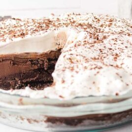 close up shot of Mississippi Mud Pie garnished with chocolate shavings in a baking dish