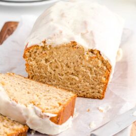 close up shot of a loaf of Eggnog Bread with glaze