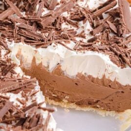 close up shot of french silk pie garnished with chopped chocolate in a baking dish