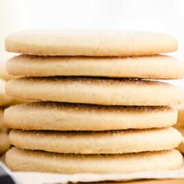 close up shot of sugar cookies stacked on top of each other