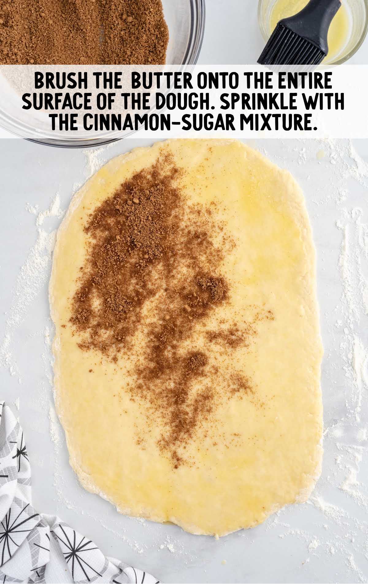 cinnamon-sugar mixture placed on top of the dough