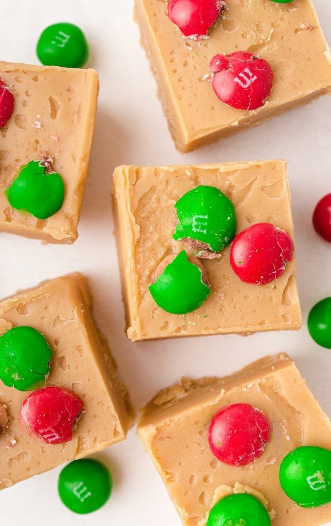 close up shot of peanut butter fudge with m&ms on the top