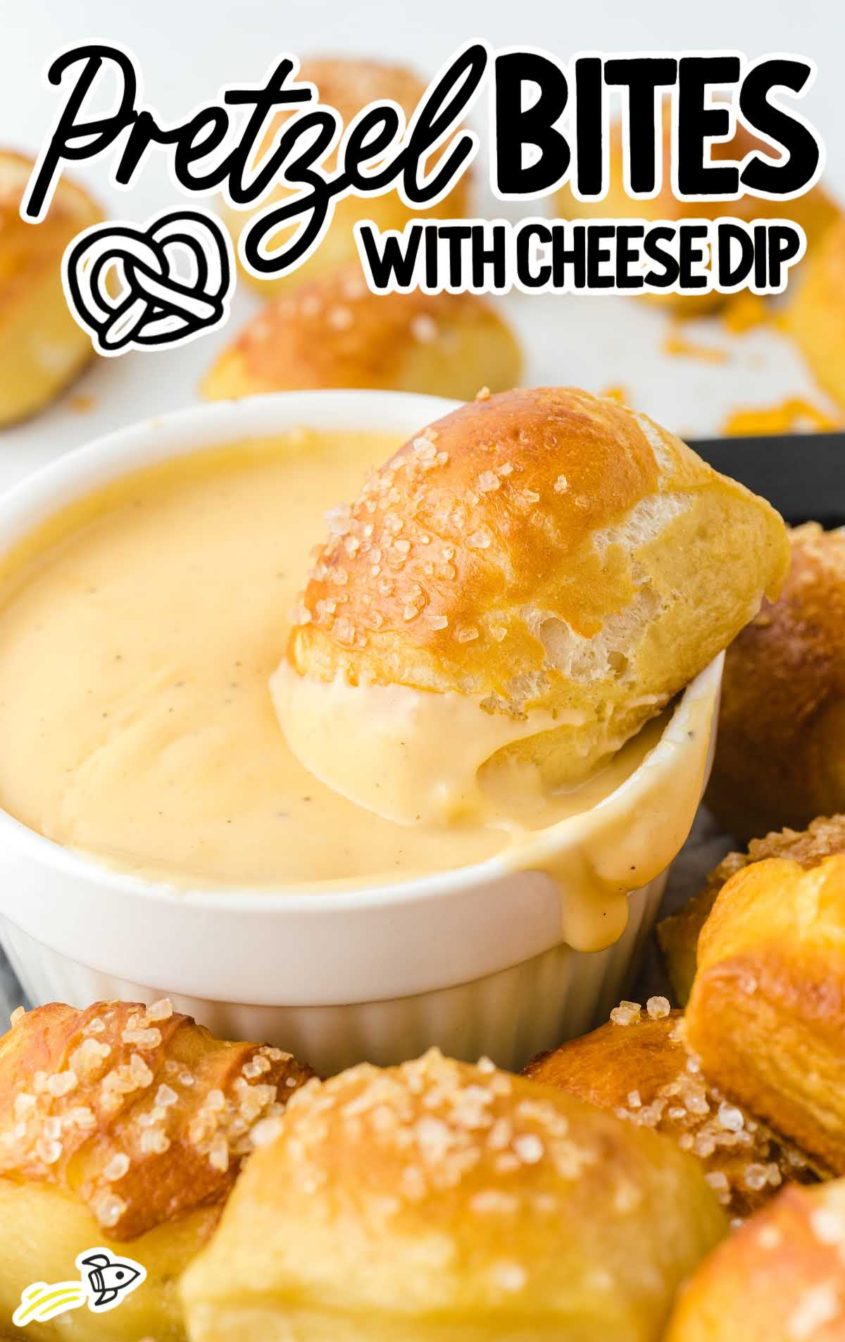 close up shot of Pretzel Bites with a bowl of cheese dip sauce