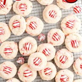 close up overhead shot of candy cane kiss cookies on a cooling rack