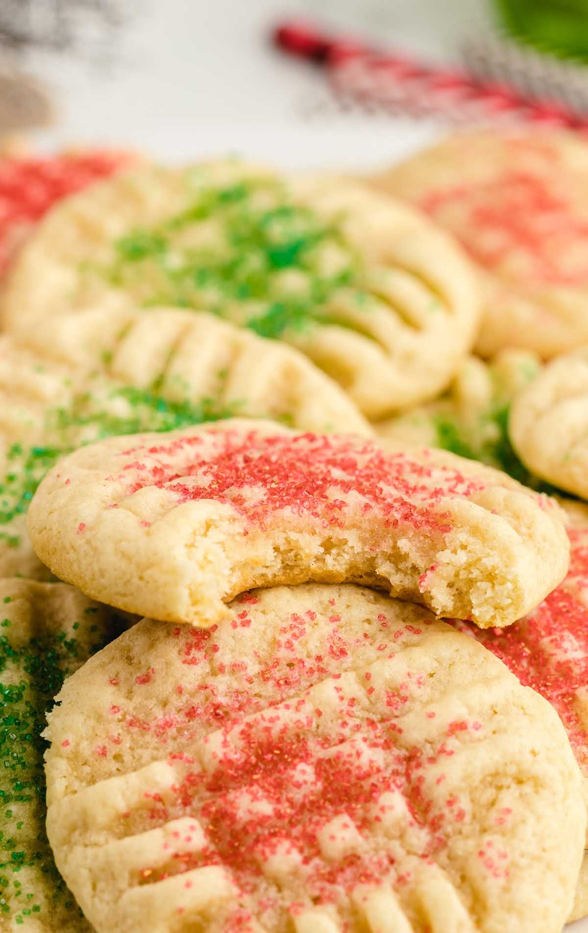 close up shot of grandma's christmas sugar cookies piled on top of each other