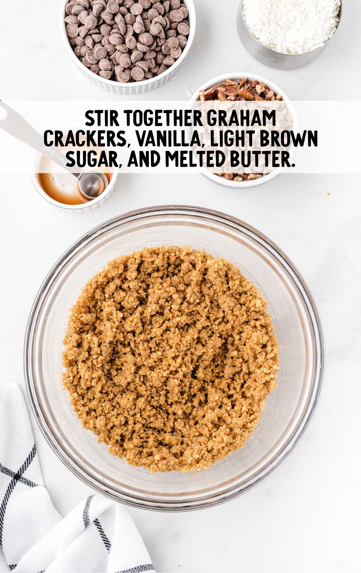 graham crackers, vanilla, light brown sugar, and melted butter stirred in a bowl