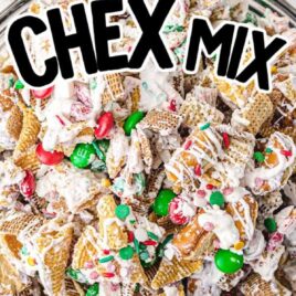 overhead shot of christmas chex mix in a clear bowl