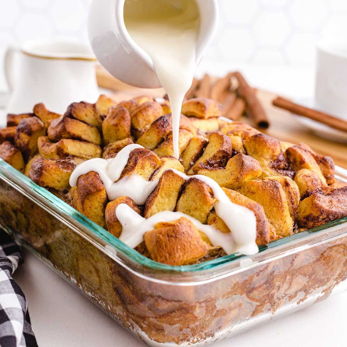 a closeup shot of Cinnamon Roll Casserole in a baking dish