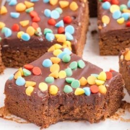 close up shot of cosmic brownies with a bite taken out