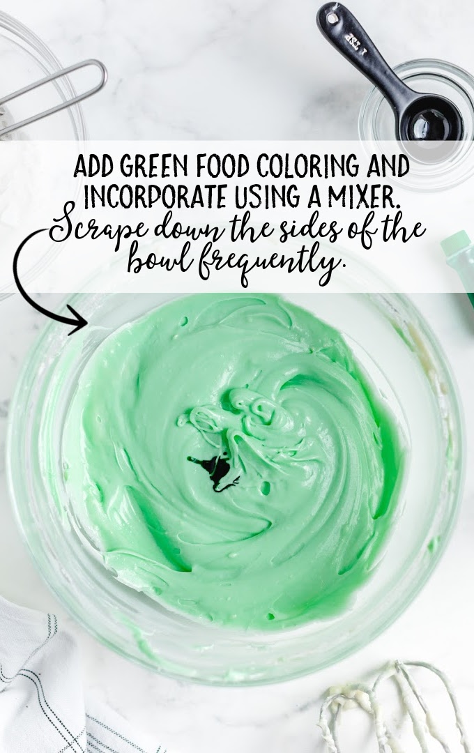 food coloring added to the cream cheese mixture in a bowl