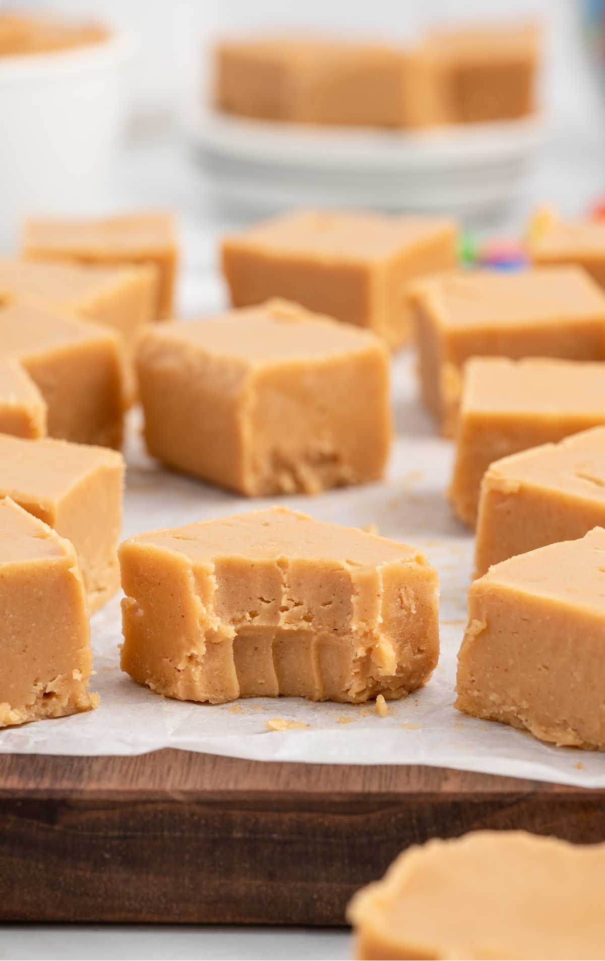 close up shot of Peanut Butter Fudge on a wooden board
