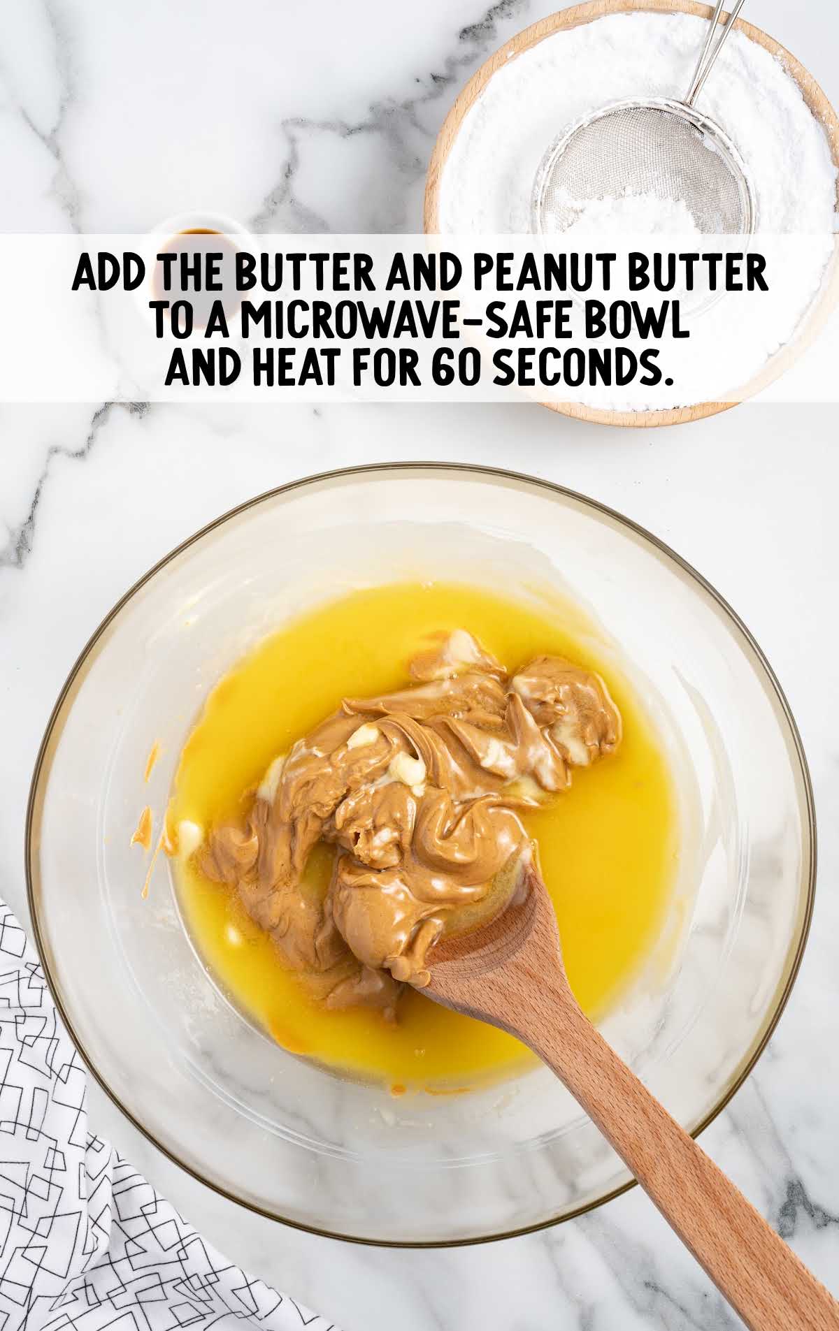 melted butter and peanut butter combined in a bowl