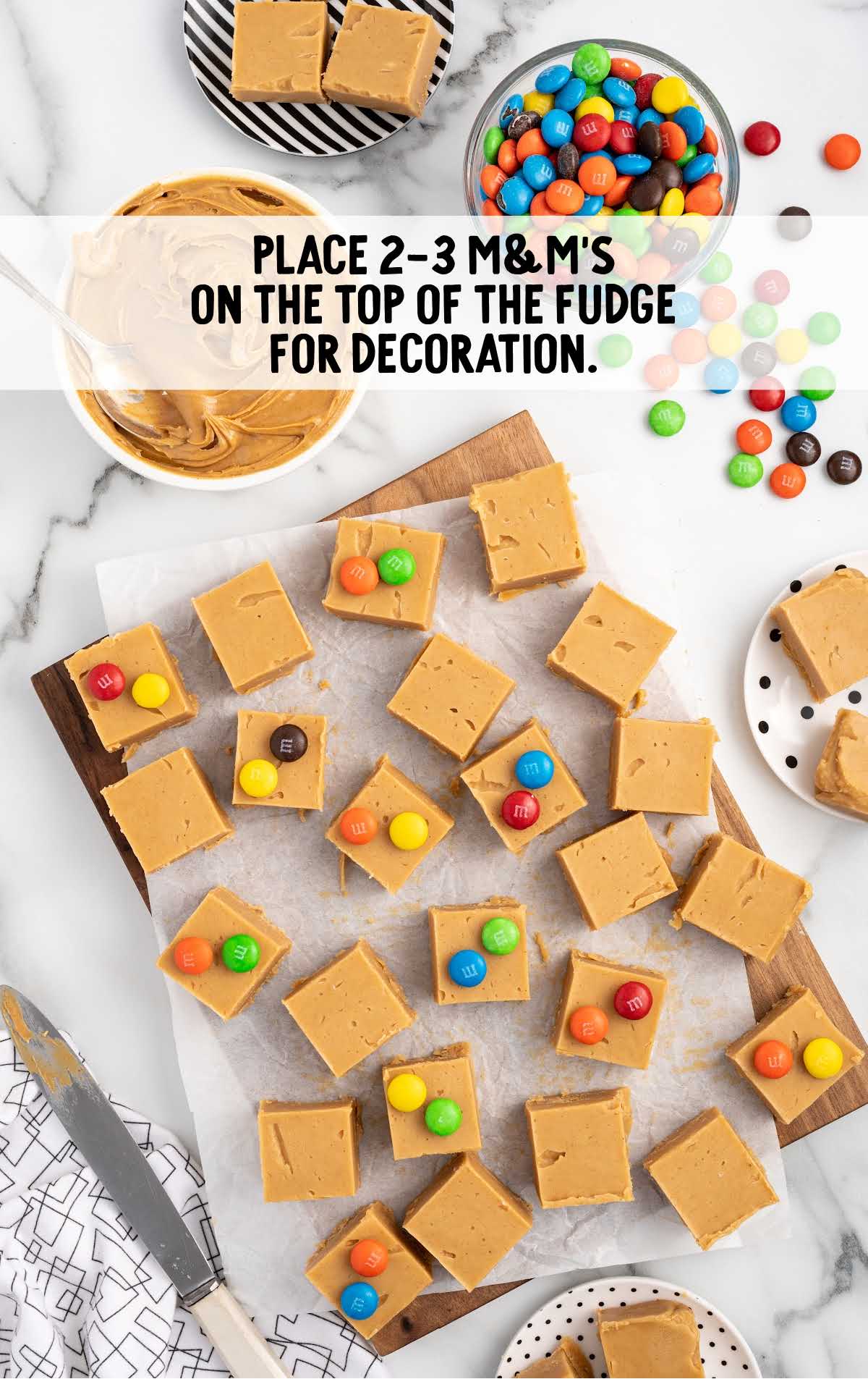 m&ms added on top of the peanut butter fudge