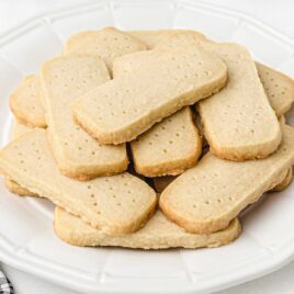 close up shot of a pile of Shortbread Cookies on a plate