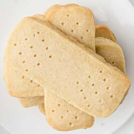 close up overhead shot of a pile of Shortbread Cookies on a plate