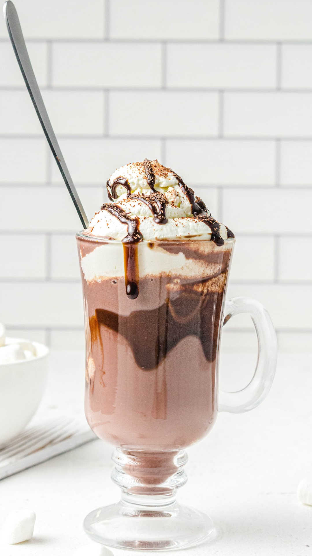 a close up shot of Spiked Hot Chocolate in a tall mug