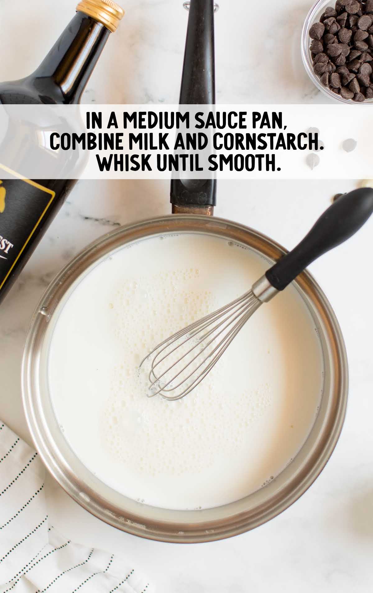 milk and cornstarch whisked in a pan
