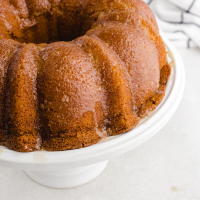 close up shot of kentucky butter cake on a white stand