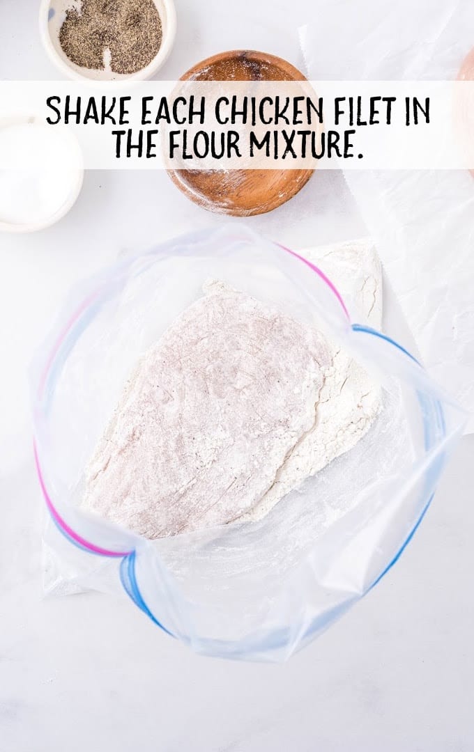 chicken marsala process shot of flour in a bag