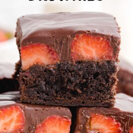 close up shot of Chocolate Covered Strawberry Brownies stacked on top of each other