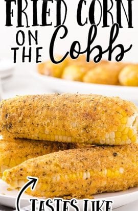 close up shot of fried corn on the cob stacked on top of each other on a white plate