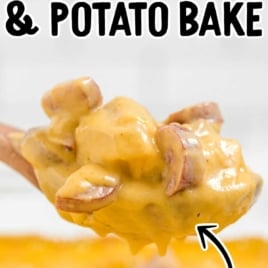 Wooden spoon lifting creamy kielbasa and potato bake with text reading “The Best Kielbasa & Potato Bake – Super Cheesy Recipe!!”