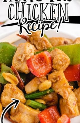 close up shot of Kung Pao chicken on a white plate