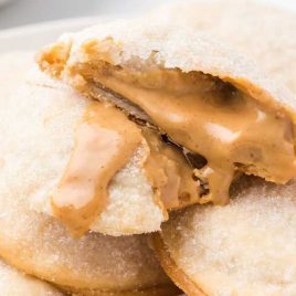 close up shot of Peanut Butter Lava Cookies stacked on top of eachother