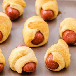 close up shot of multiple Pigs in a Blanket