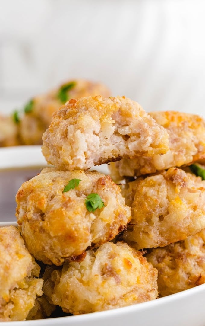 close up shot of hashbrown bites on a white plate