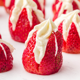 close up shot of cheesecake stuffed strawberries