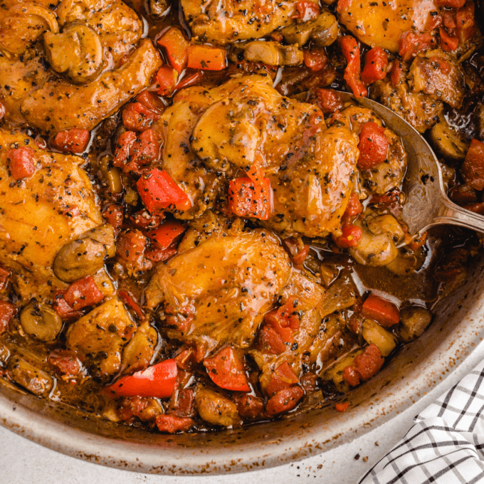 close up overhead shot of chicken cacciatore in a dish