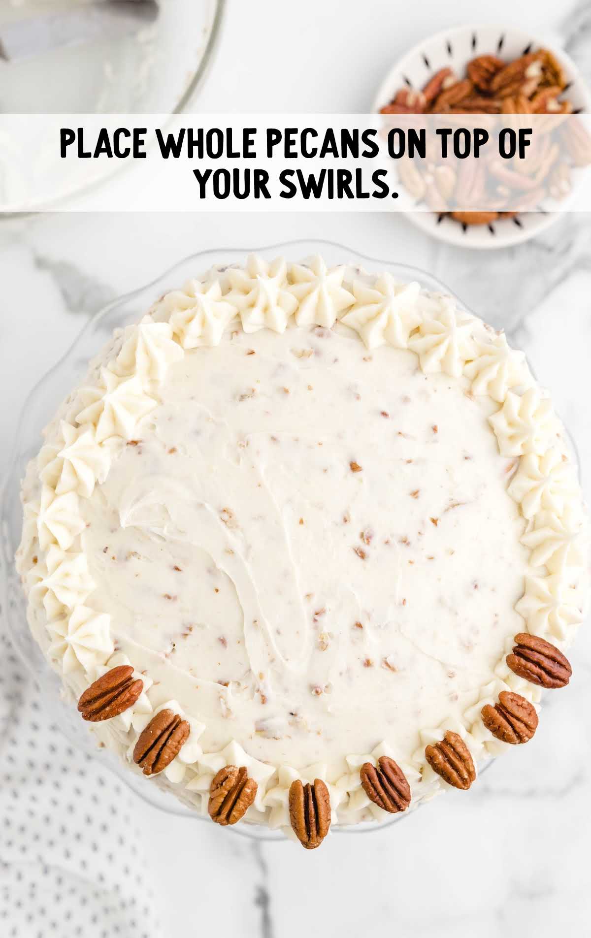 pecans placed on top of the cake