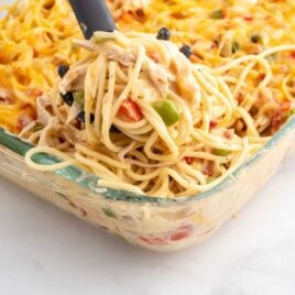 close up shot of a baking dish full of Chicken Spaghetti