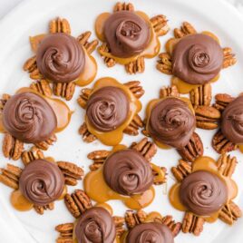 close up overhead shot of a bunch of Chocolate Turtles on a plate