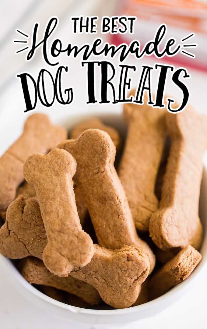 close up shot of homemade dog treats piled in a white bowl