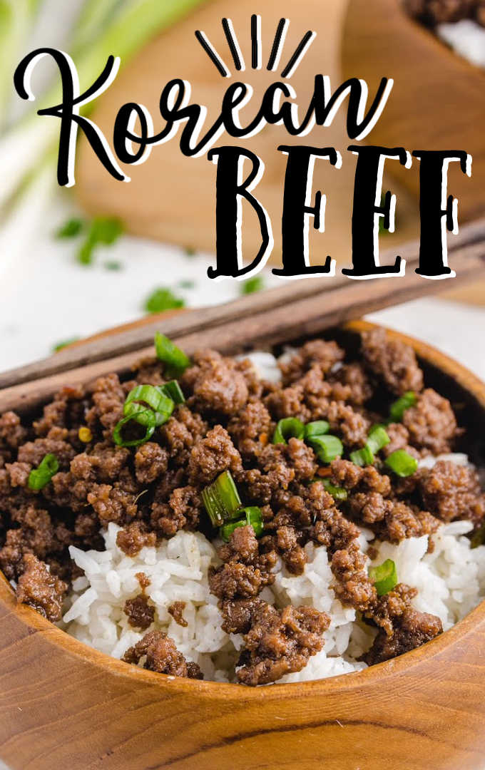 close up shot of korean beef served over rice and garnished with onions in a bowl
